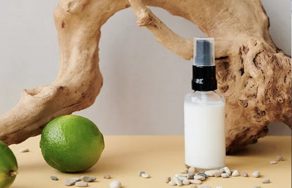 White Bottle Beside Brown Wood